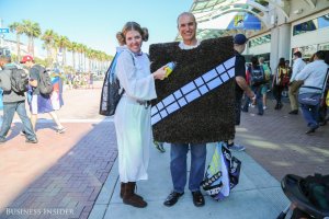 another-princess-leia-takes-a-portable-vacuum-to-her-walking-carpet-companion