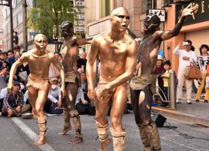 Members of Japan's avant-garde dance group вЂњDairakudakanвЂќ perform at a festival in Tokyo on May 5, 2015. Vacationers enjoy the Ginza Yanagi festival including street performances and dance by Geisha girls to mark Japan's week-long Golden Week holidays. (Photo by Yoshikazu Tsuno/AFP Photo)