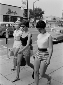 Teens on sidewalk, ca. 1950s